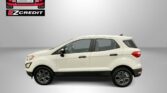 White compact SUV displayed indoors with EZCredit logo and Easton Motors branding in the top left corner; slogan below reads 'APPLY, ARRIVE & DRIVE!'