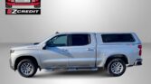 Silver pickup truck against a gray backdrop with Easton Motors EZ Credit logo; bottom text reads 'APPLY, ARRIVE & DRIVE!'