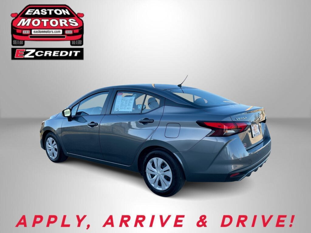 Blue sedan shown in an ad with Easton Motors EZ Credit logo top left and 'APPLY, ARRIVE & DRIVE!' at the bottom safety text area.