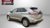 Silver SUV shown with Easton Motors EZCredit branding and the caption 'APPLY, ARRIVE & DRIVE!' at the bottom of the image.