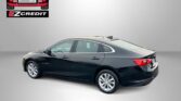 Promotional image with a black Malibu sedan, Easton Motors logo, and EZ Credit branding on a gray gradient background.