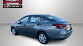 Blue sedan shown in an ad with Easton Motors EZ Credit logo top left and 'APPLY, ARRIVE & DRIVE!' at the bottom safety text area.