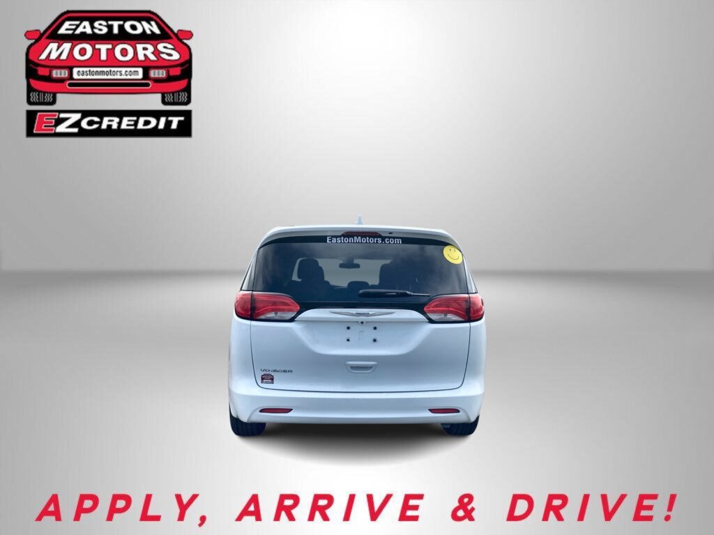Rear view of a white SUV with Easton Motors logo on the window; bold red slogan 'APPLY, ARRIVE & DRIVE!' visible at bottom.