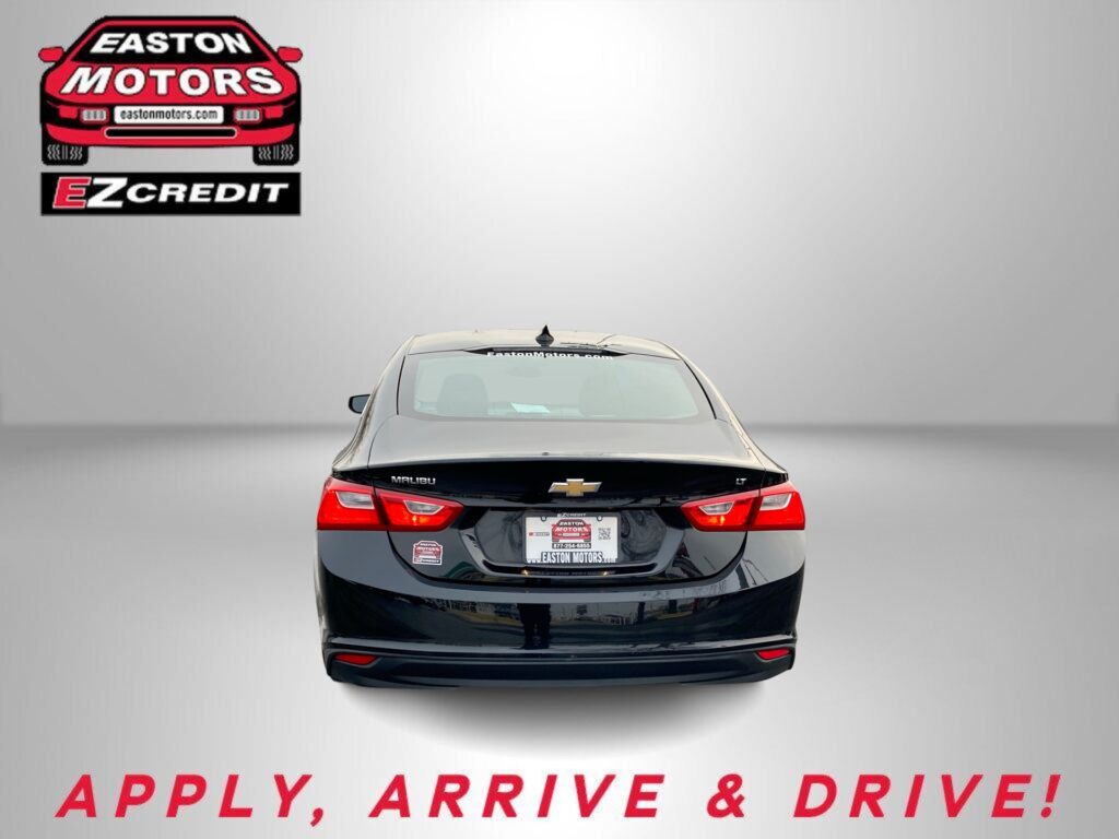 Rear view of a black Chevrolet with Easton Motors logo on the left and the slogan 'APPLY, ARRIVE & DRIVE!' at the bottom.