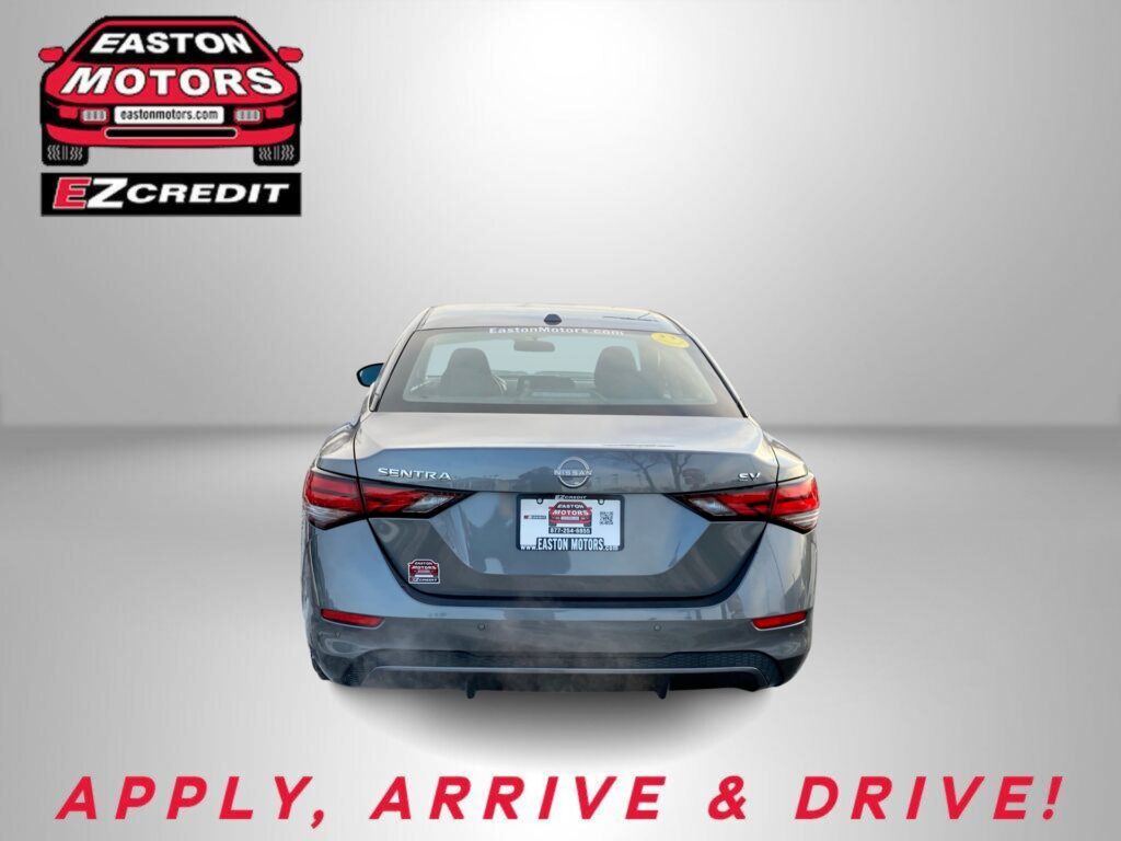 Rear of a gray Nissan Sentra with Easton Motors logo in the top left and 'APPLY, ARRIVE & DRIVE!' in red text at the bottom.