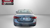 Rear of a gray Nissan Sentra with Easton Motors logo in the top left and 'APPLY, ARRIVE & DRIVE!' in red text at the bottom.