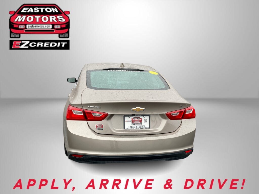 Beige Chevrolet rear view with Easton Motors logo in the top left and promotional text 'APPLY, ARRIVE & DRIVE' at the bottom.
