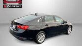 Black sedan shown from the rear with EZ Credit logo in the top-left and 'APPLY, ARRIVE & DRIVE!' text along the bottom edge.