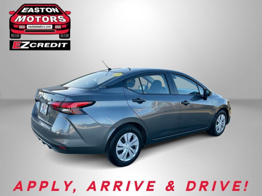 Blue car with EZ Credit logo in top-left, advertising
