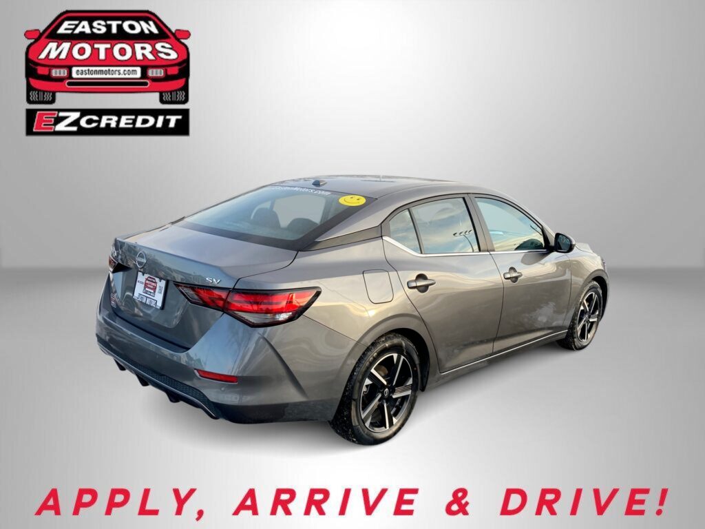 Gray sedan featured in a dealership promo, with Easton Motors logo in the top-left and the slogan 'APPLY, ARRIVE & DRIVE!' at the bottom.