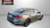 Gray sedan featured in a dealership promo, with Easton Motors logo in the top-left and the slogan 'APPLY, ARRIVE & DRIVE!' at the bottom.