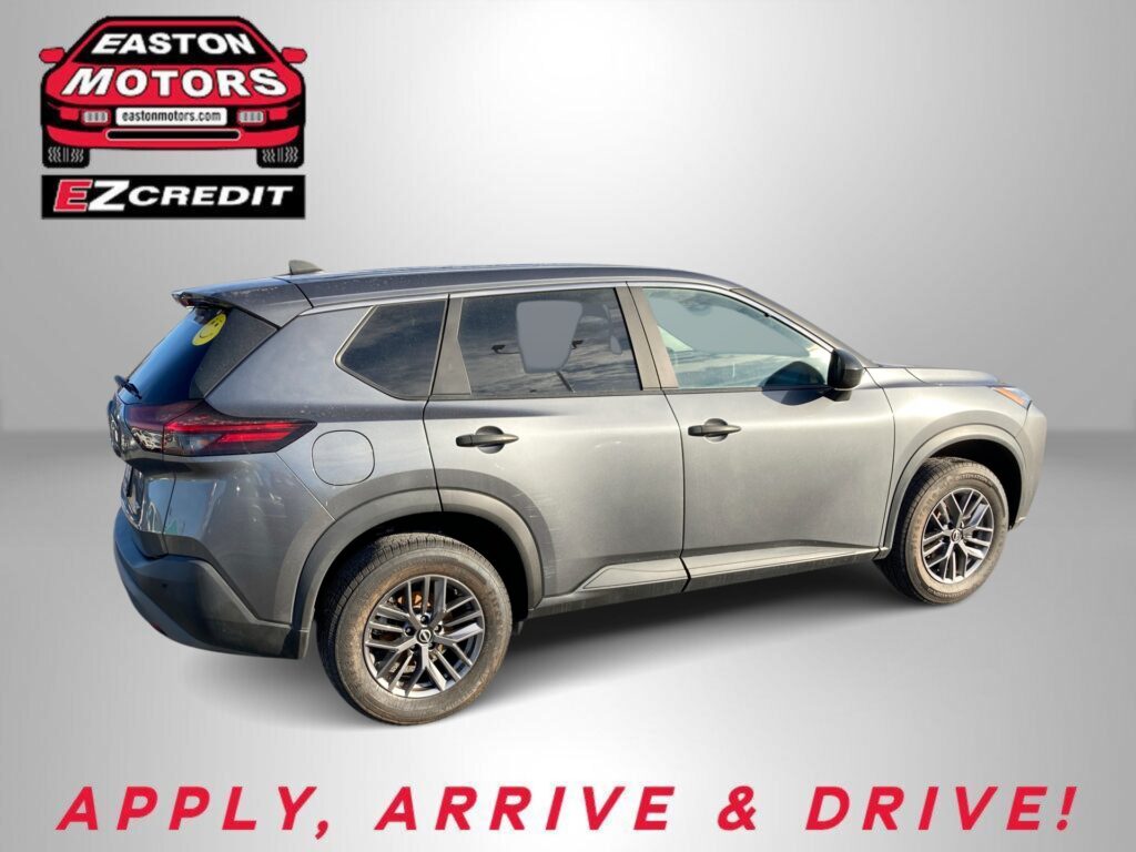 Car from Easton Motors advertising EZCredit with slogan 'Apply, Arrive & Drive!' in a gray studio backdrop