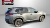 Car from Easton Motors advertising EZCredit with slogan 'Apply, Arrive & Drive!' in a gray studio backdrop