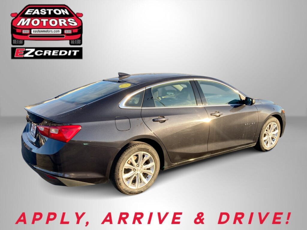 Dark gray sedan shown from a rear-side view with an Easton Motors EZCredit logo in the top left and 'APPLY, ARRIVE & DRIVE!' text along the bottom banner.