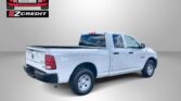 White pickup truck against a gray background with the Easton Motors logo and the slogan "Apply, Arrive & Drive!"