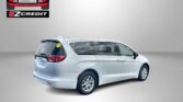 Advertisement banner featuring Easton Motors EZCredit logo with a red car graphic and a silver minivan, captioned 'APPLY, ARRIVE & DRIVE!' at the bottom.