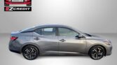 Grey sedan shown in profile with Easton Motors logo in the top-left and 'APPLY, ARRIVE & DRIVE!' slogan at the bottom.