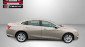 Red car graphic with 'EASTON MOTORS' and 'EZ CREDIT' logo in top-left; beige sedan shown below on a gray gradient background with 'APPLY, ARRIVE & DRIVE!' text at bottom.