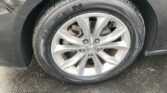 Close-up of a car wheel with a silver alloy rim and Chevrolet emblem in the center