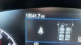 Odometer reads 13,041.7 miles; a blue-outlined vehicle diagram is shown on the dashboard screen.