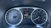 Close-up of a car instrument cluster: left tachometer, right speedometer, center digital readout with 56°F, avg MPG 35.7, ODO 1374 mi, and fuel/warning icons visible.