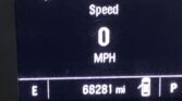 Digital car dashboard showing speed 0 mph, odometer reading 68,281 miles, and a fuel icon on the right.