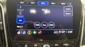In-car touchscreen showing FM radio tuned to 101.5, with preset stations 94.1, 94.9, 104.1, 106.9 across the top, and Sound/Browse buttons on the right.