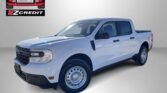 White pickup truck angled to the right with Easton Motors and EZCredit logos on a gray backdrop; red 'APPLY, ARRIVE & DRIVE!' text at bottom.