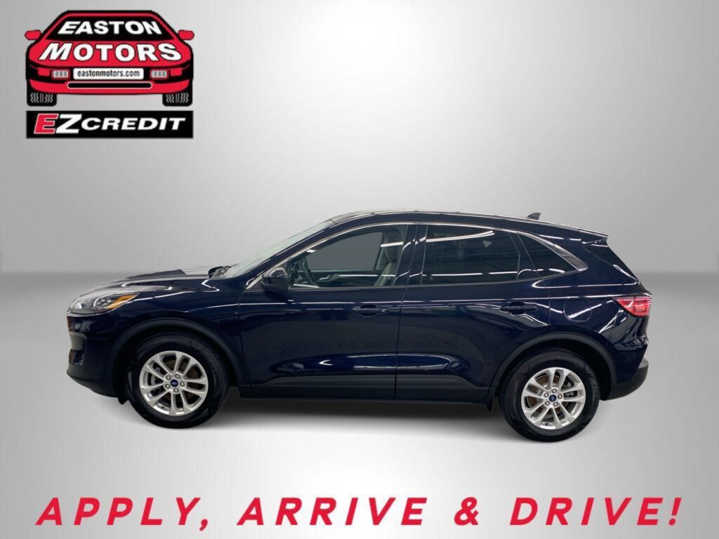 Side view of a dark blue SUV with Easton Motors logo in the upper left and the slogan 'APPLY, ARRIVE & DRIVE' at the bottom.