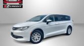 White minivan in the foreground with Easton Motors logo and EZ Credit branding on a gray gradient backdrop, plus the slogan 'Apply, Arrive & Drive!' at the bottom.