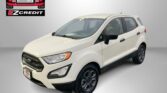 White SUV shown from a three-quarter front view in a studio setting, with Easton Motors EZCredit logo on the left and 'APPLY, ARRIVE & DRIVE!' in red text at the bottom.