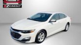 White Chevrolet sedan displayed for sale with Easton Motors EZCredit logo in the top-left corner and 'APPLY, ARRIVE & DRIVE!' slogan at the bottom.