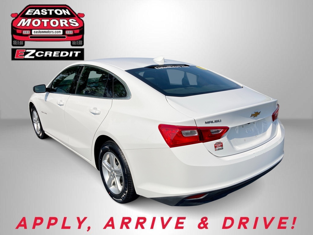 White Chevrolet Malibu seen from rear three-quarter angle, with Easton Motors EZCredit branding in the top-left and 'APPLY, ARRIVE & DRIVE' at the bottom.