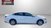 White sedan viewed from the side with Easton Motors and EZCredit logos in the corner, advertising auto financing.